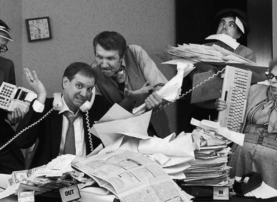 Chaotic in-house operations with overflowing paperwork and overloaded staff.